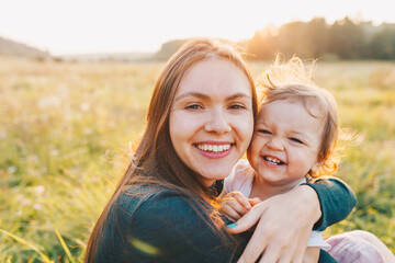 mother and daughter playing
