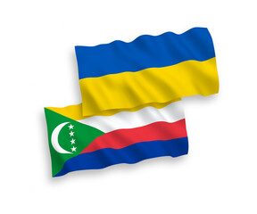Flags of Union of the Comoros and Ukraine on a white background