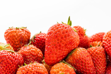 Fresh strawberries on a monochrome background