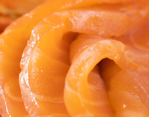 Salmon sashimi close-up , raw sliced salmon meat close-up - selective focus