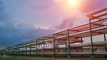 Background of petrochemical pipeline on pipe rack at industrial zone.
