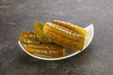 Marinated pickled cucumbers in the bowl