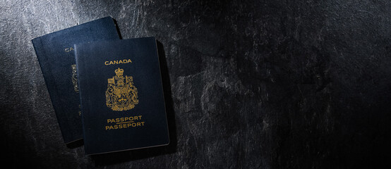 Composition with two Canadian passports - obrazy, fototapety, plakaty