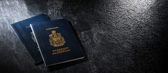 Composition with two Canadian passports