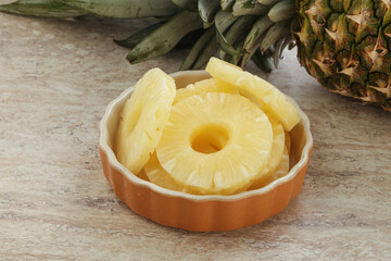 Marinated pineapple rings in the bowl