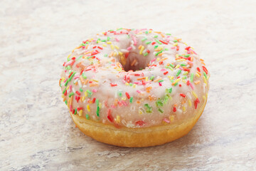 Sweet glazed vanilla donut with icing