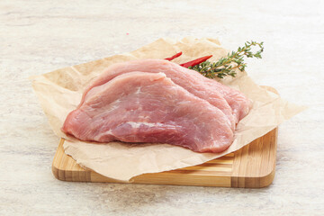 Raw pork schnitzel for roast