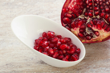 Ripe red Pomegranate seeds in the bowl