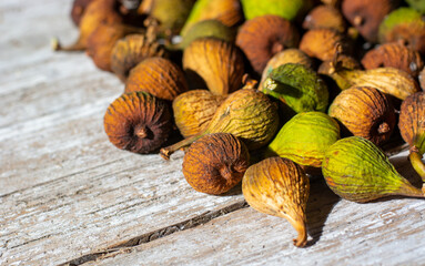 the sun illuminates dried figs under the rays of the sun