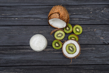 Fototapeta na wymiar half coconut and kiwi