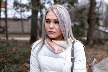 Naklejka premium Portrait of depressed disappointed beautiful platinum blonde woman. Boyfriend not show up on date meeting, left alone