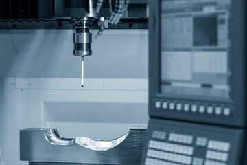 The CMM probe measuring the footwear mold part on the CNC milling machine.