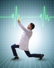 Doctor cardiologist supporting cardiogram heart line