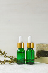 Eco cosmetic products for skin care. Glass cosmetic bottles and soap with natural essential oil, vitamin and prebiotic serum for health.