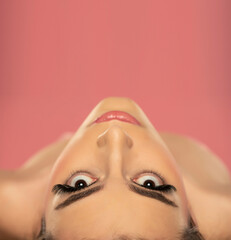 Beautiful macro shot of female eyes with extreme long false eyelashes. Perfect shape make-up and long lashes.