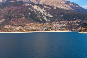 Molveno village, tourist resort on the coast of the lake Molveno, Italian Alps, Brenta Dolomites,...