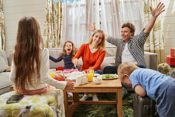Happy children and parents having fun together