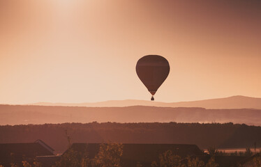 hot air balloons at sunset - freedom and adventure concept