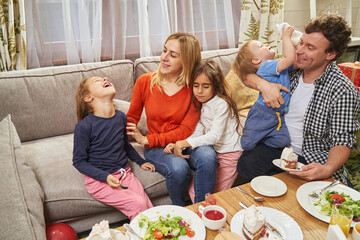 Parents with children talking and having fun
