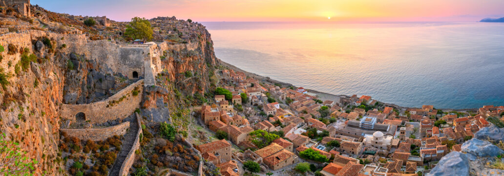 picturesque parorama old medieval castle town of Monemvasia in Lakonia at sunrise, Peloponnese, Greece. "Greek Gibraltar"