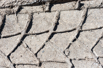 Obraz premium Gardening and agriculture. Tracks on clay field.