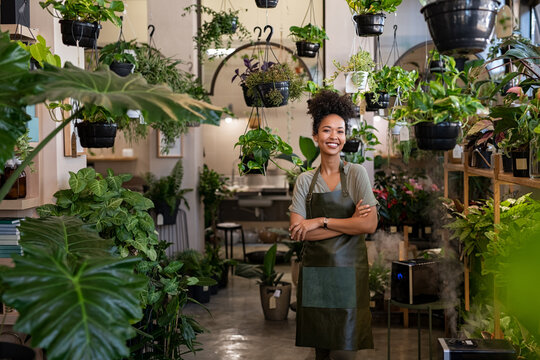 Woman working in plant flower shop
