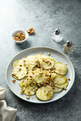 Courgette carpaccio with walnut and olive oil