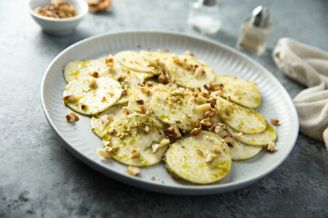 Courgette carpaccio with walnut and olive oil