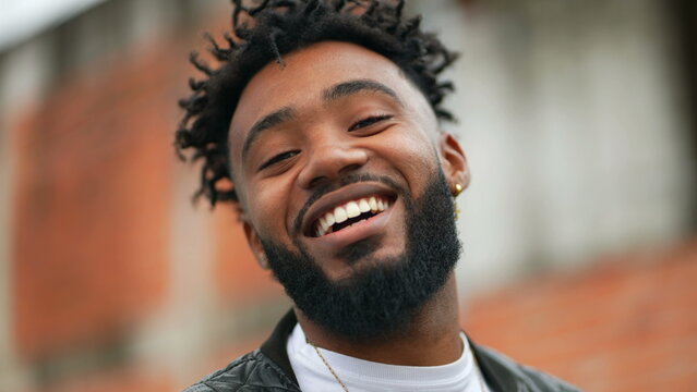 Portrait of a happy black Brazilian man face smiling and laughing