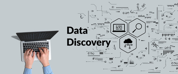 Data discovery concept. A person works at a laptop and analyzes information.