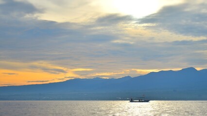 sunset on the sea, singaraja, bali