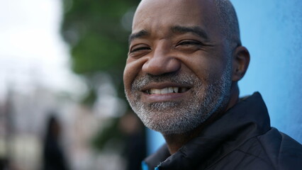 Fototapeta premium A smiling senior black man portrait face