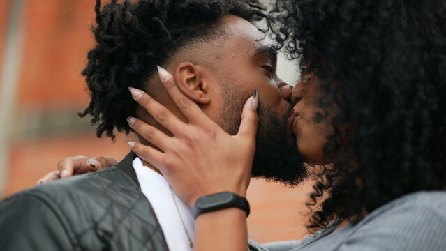 A latin black couple kissing each other boyfriend and girlfriend kiss