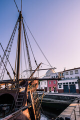 Details of the bow of a 16th century nau at dusk moored in the marine, Vila do Conde PORTUGAL