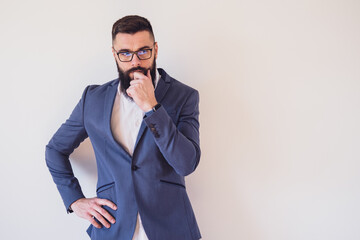 Portrait of businessman who is thoughtful and worried. Copy space on image for your text or advert.