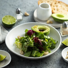 Healthy green salad with avocado