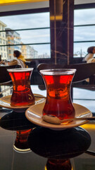 Two cups of turkish tea, Istanbul cafe with oriental culture of the street food.