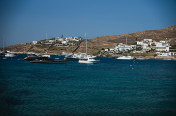 Port of Mykonos in Ornos, Mykonos is known for its Cycladic architecture (whitewashed houses,...