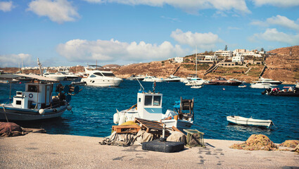 Port of Mykonos in Ornos, Mykonos is known for its Cycladic architecture (whitewashed houses,...