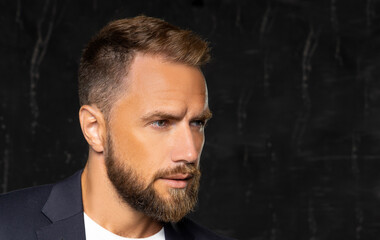 Handsome man with beard close-up portrait