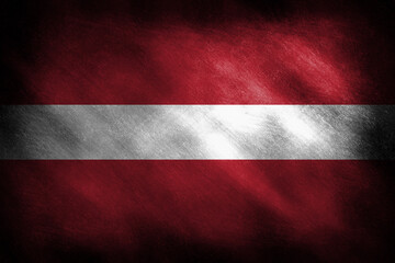 The Latvian flag on an old looking background