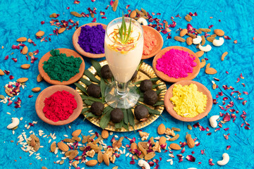 Special Indian Beverage Called Shahi Bhaang Thandai is Cannabis Infused Cooling Drink Made Of Bhang, Milk, Soaked In Dry Fruits Like Almonds Badam Pista Aniseed Rose Petals