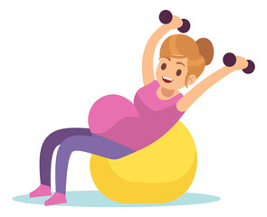 Pregnant woman doing weight exercise on birth ball