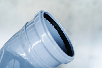 Fragment of a polypropylene pipe with a rubber gasket. Detail for the installation of the sewer...