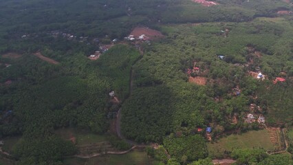 A forest route in Kollam, Kerala (India). Taken near by of Jatayu Earth Center stands at an altitude of 350m above the mean sea level.