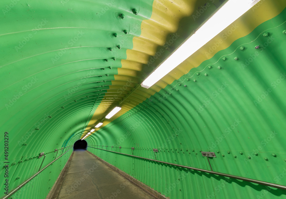 Poster Empty pedestrian tunnel at night. Architecture abstract background