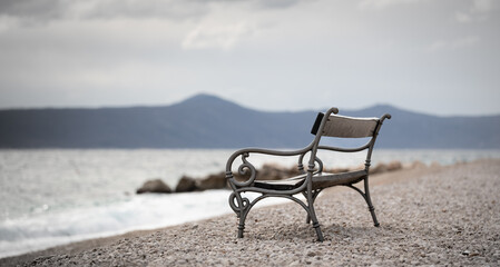Bench on the beach by the sea