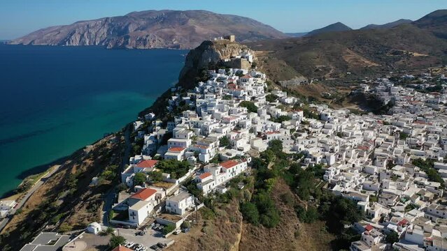 Aerial drone video of breathtaking and picturesque main village of Skyros island featuring uphill medieval castle with scenic views to Aegean sea, Sporades islands, Greece