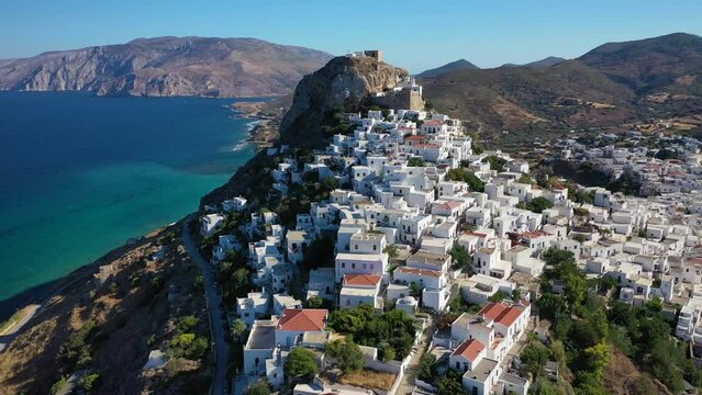 Aerial drone video of breathtaking and picturesque main village of Skyros island featuring uphill medieval castle with scenic views to Aegean sea, Sporades islands, Greece