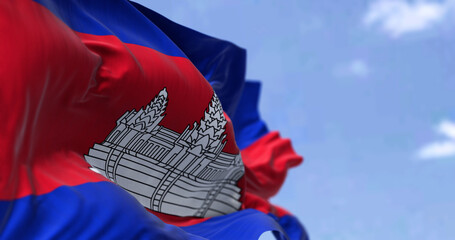 Detail of the national flag of Cambodia waving in the wind on a clear day.
